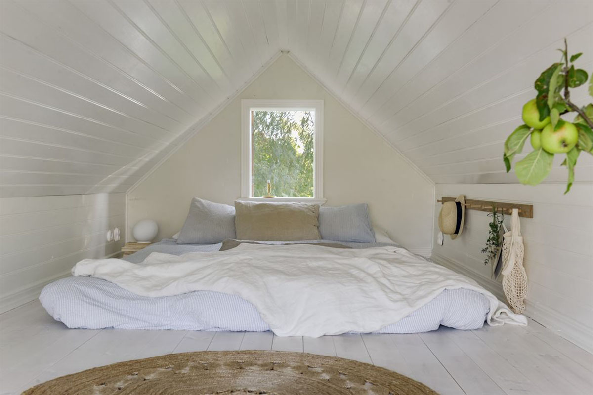 Bedroom white with bed on the floor