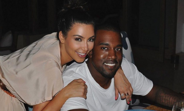 Kanye West köper hus mitt emot Kim Kardashian